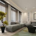 Fancy apartment living room interior with large floor to ceiling window blinds and soft gray modular sofa. Includes blank walls and picture frame with copy space. 3d Rendering.